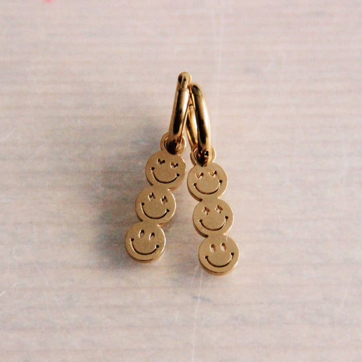 Stainless steel hoop earrings with 3 smileys – gold