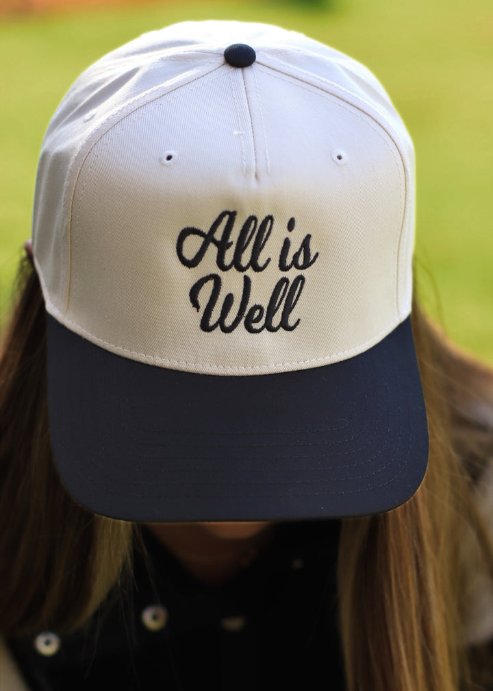 All Is Well- Embroidered Trucker Hat- Black/Natural Hat